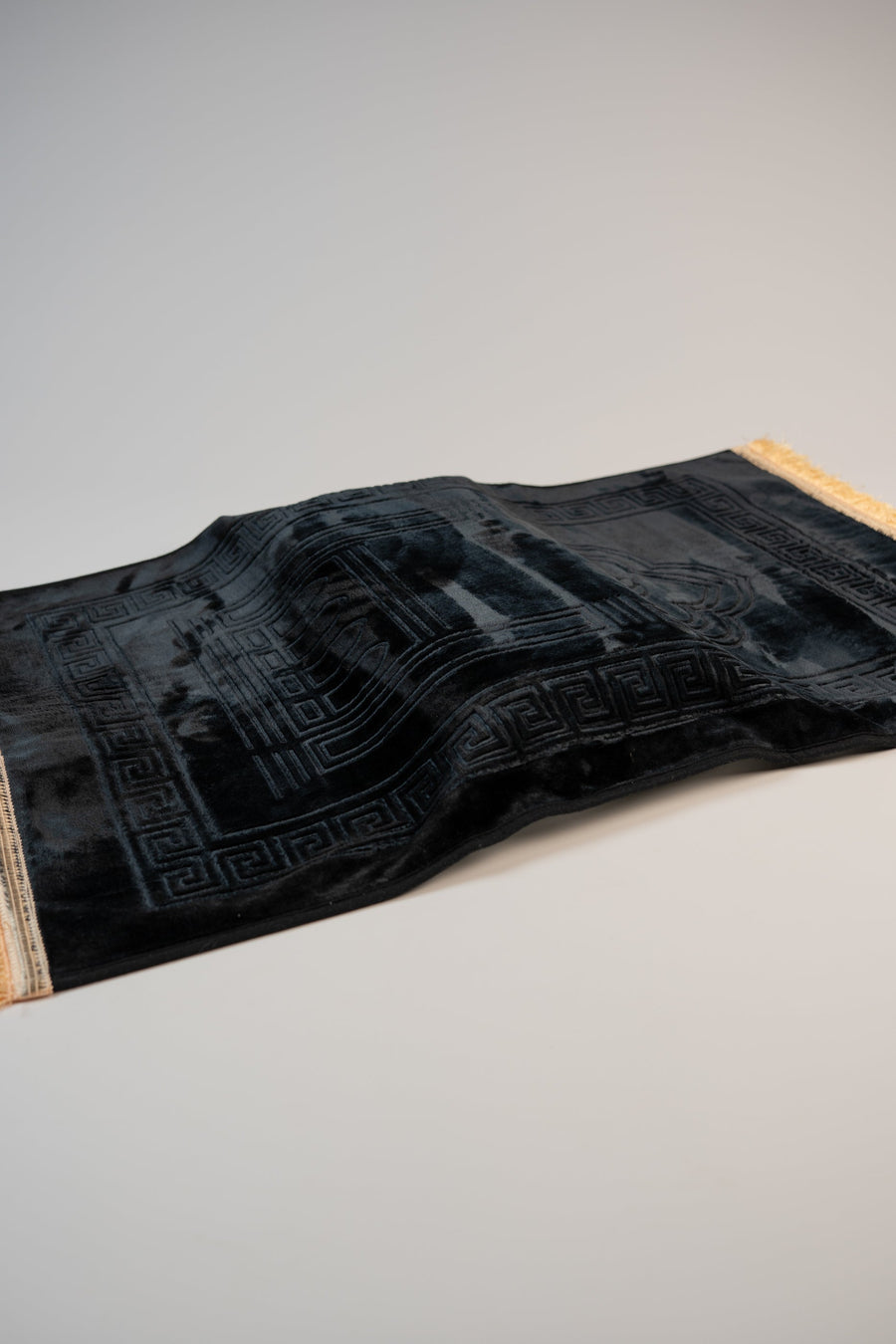 Ergonomic prayer mat seen from the side