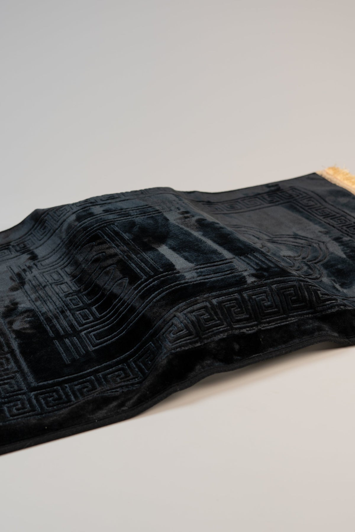 Ergonomic prayer mat in Black, velvet top and fringed edge