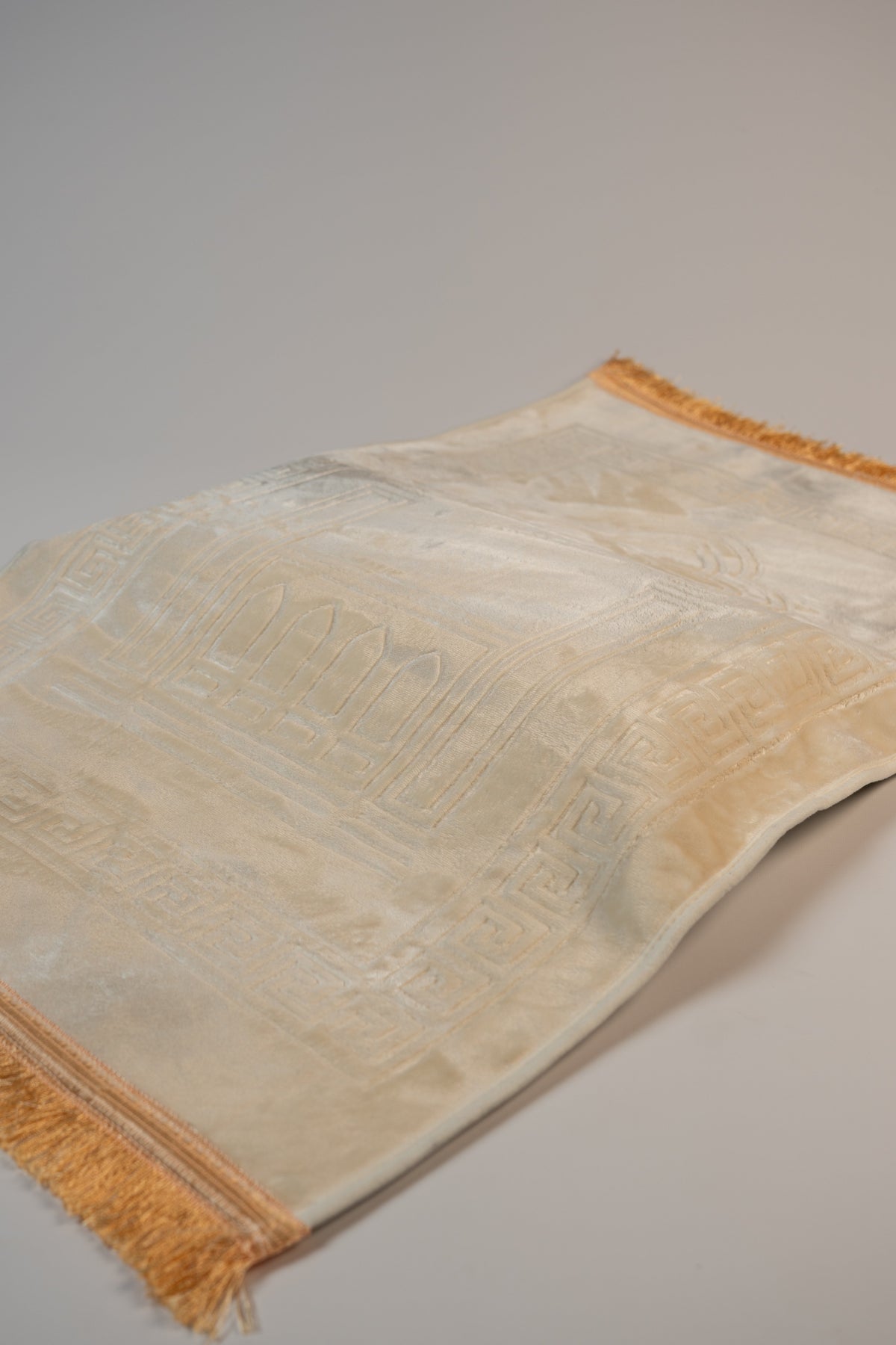 Ergonomic prayer mat in Beige, velvet top and fringed edge