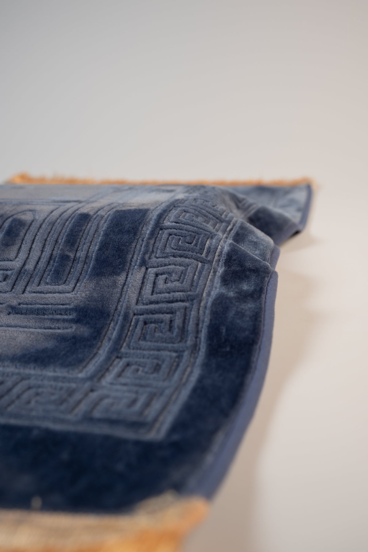 Ergonomic prayer mat in Navy Blue, embossed border detail