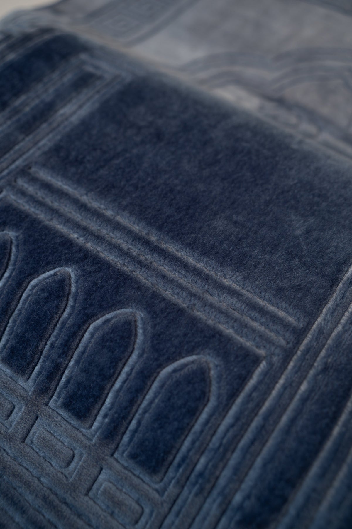 Close-up of the embossed mihrab arches, Navy Blue